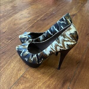 Aldo Black and Tan Stiletto Heels